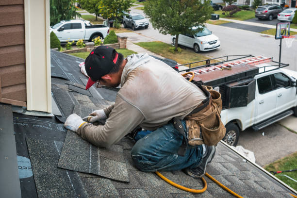 Professional Roofing technician working in Sumava Resorts, IN